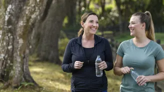 Two women walking outdoors
