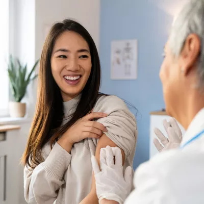 A Patient Smiles After Receiving a Flu Shot