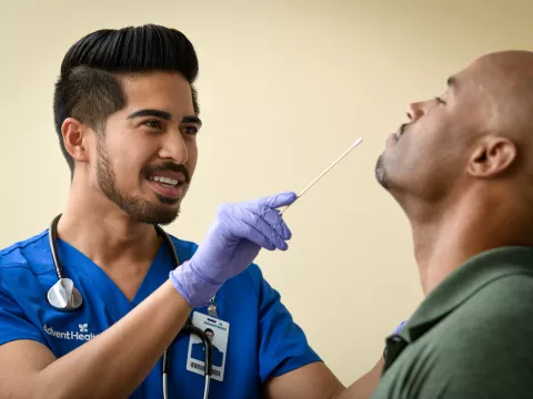 Centra Care Provider Gets Ready to Swab a Patient