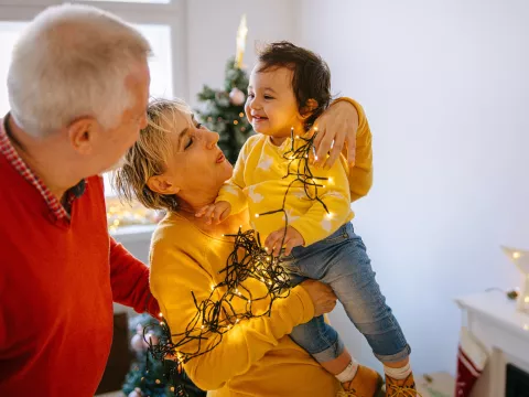 Trimming the tree with the family. 