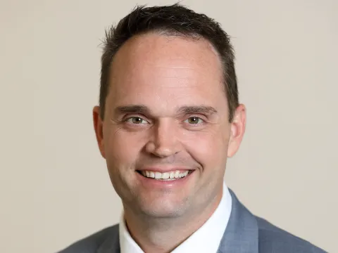 Headshot of Sam Huenergardt
