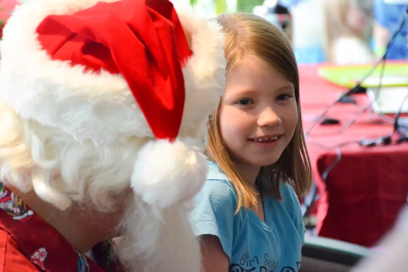 A child at AdventHealth celebrates Christmas in July.