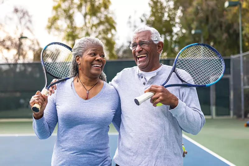 A couple playing tennis